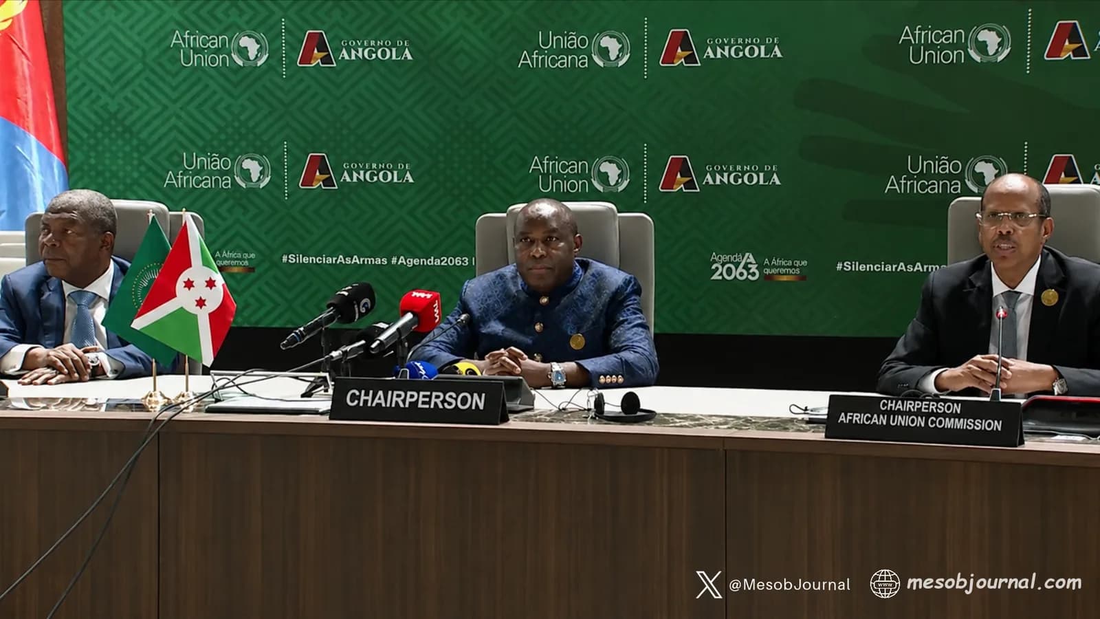 African Union officials seated at a press conference table in Angola.