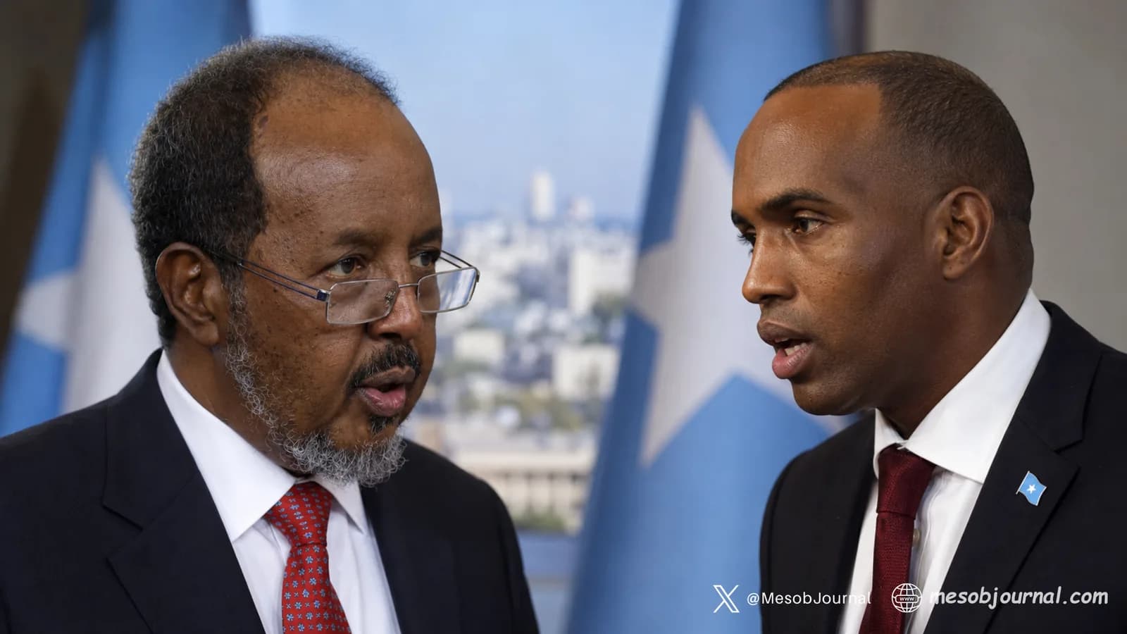 Somali political rivals in tense face-to-face scene.